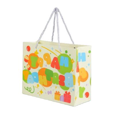 China Recycled Materials Eco Friendly Shopping Bags Shopping Bag Paper With Handles Custom Printed Paper Bags for sale