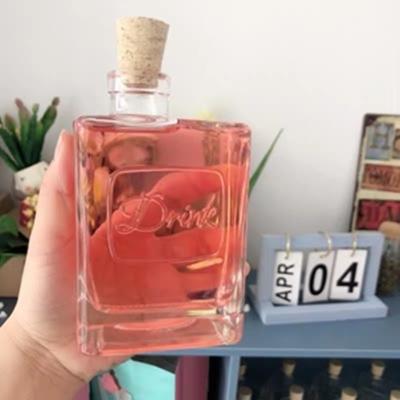 China New Fashion Eco-friendly Twisted Mouth Glass Bottle Drink Bottles Empty Glass Bottle For Milk for sale