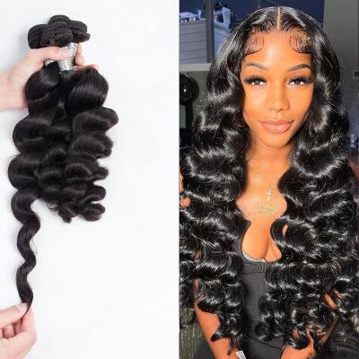 China Good Texture Can Keep Brazilian Remy Human Hair Weave Bundles Long Time Bonds Loose Wave Bundles Natural Color 28 30 32 34 40 Inch Wavy Hair Extensions for sale