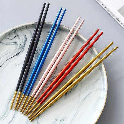 China Viable Loose Titanium Metal Chopsticks Custom Printed Logo Pairs Chopsticks Ressable Sushi Stainless Steel Chopsticks for sale