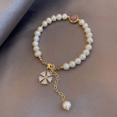 China New Fashion TRENDY French Zirconia Flower Bracelet For Temperament Trend Pearl 14k Female Freshwater Gold Plated Jewelry Bracelet for sale