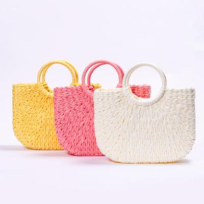 China Custom Lady Summer Beach Paper Weaving Ladies Protalbe Straw Bags With No Seal Three Color Optional for sale