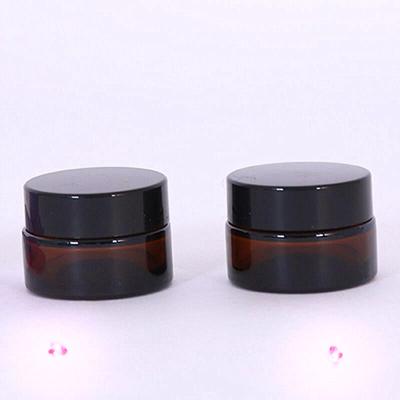 China Skin Care Cream 15ml Amber Glass Cosmetic Cream Jar Medical Wax Balm Jar With Gold Silver Black Lids for sale