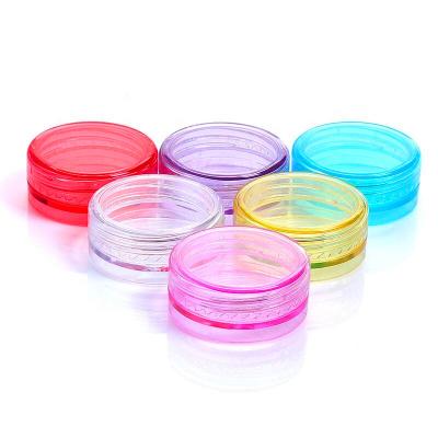 China Skin care lipbalm 2g cream colored plastic cosmetic ointment jars jar for nail art glitter can do other colors of cap for sale