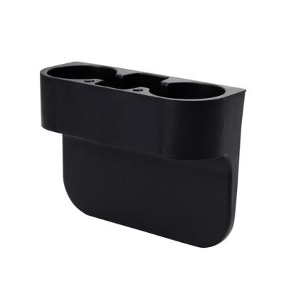 China Fancy 3 in 1 Multifunctional Black Plastic Auto Storage Box Phone Bottle Holder Car Drinks Holder for sale