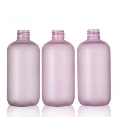 China 300ml PET Empty Refillable Boston Plastic Round Cosmetic Bottle For Toner Bath Cream Making for sale