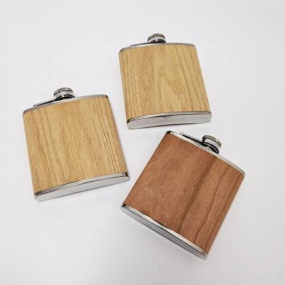 China Custom Hip 6oz Wooden Flask Novelty Stainless Steel Portable Whiskey Flask for sale