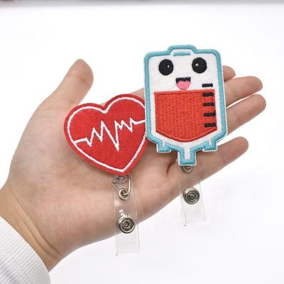 China Office School Badge Holder Pull Coil ID Plastic Retractable Retractable Card Holder for sale