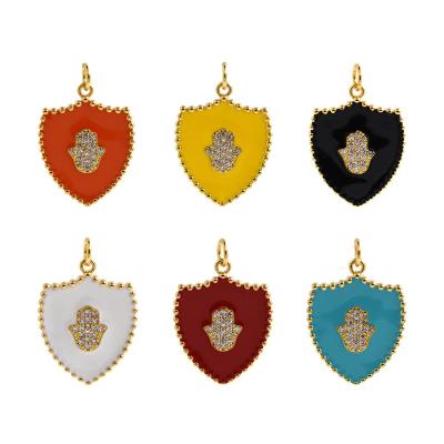 China Other New Design Gold Plated Medal Enamel Pendant Micro Pave Hand Hassam Pendant CZ Badge Charm Pendant for sale