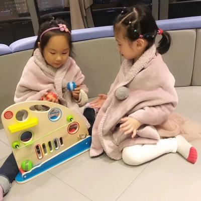 China With 2 pockets and 1decorative ball fashion style super soft custom design coat covering fleece hoody for kids for sale