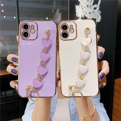 China Heart Shockproof Wristband Love Soft Tpu Phone Case For iPhone 11 12 13 Pro X Mini Se Max Plated Back Cover Phone Bumper Case for sale