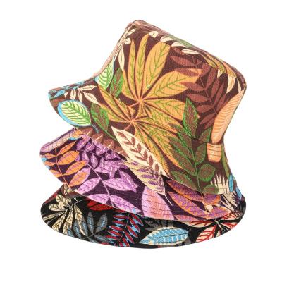 China KENSHELLEY medium hot sale new style travel beach hat double sided women spring and summer canvas hat printed fisherman hat for sale