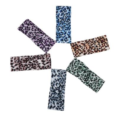 China Wholesale KENSHELLEY Daily Life Twist Knot Headband Multiple Leopard Printed Sports Yoga Elastic Headband For Women for sale