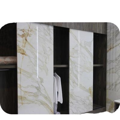 China Calacatta Luxury Golden Bedroom Upper Class Fashion Armoire Wardrobe Customized Natural Marble Cabinet for sale