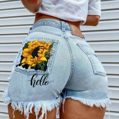 China New 2022 XW024 fashion women sexy denim pocket floral print breathable jeans ripped hot raw edge irregular trousers shorts for lady for sale