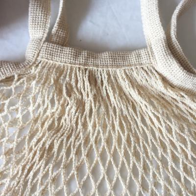 China Rope handle reusable organic cotton mesh fruit and vegetable cotton mesh laundry withshopping washable bag for sale