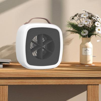 중국 Small household appliances mini AC 220V/11V electric PTC fan heater 500w desktop office home warm air blower 판매용