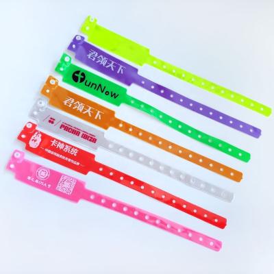 China Events Party BANGLES Neon Color Custom Lock ID Plastic Vinyl Wristbands in Wide Shape for sale