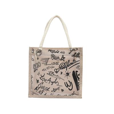 China Hot Selling Transparent Handled Graffiti Clear Crystal PVC Women Shape Shoulder Beach Bag Grocery Tote Jute Bags Gift for sale