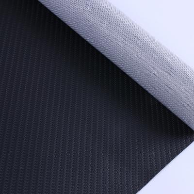 China 0.6mm PVC synthetisches Leder geprägt Gewebtes Ledermuster für Autositze zu verkaufen