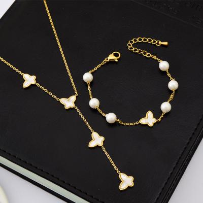 China New Environmental Friendly Shell Butterfly Pearl Charms Bracelet Necklace Set White Gold Plated Stainless Steel Tassel Jewelry Set for sale