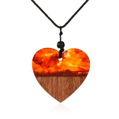 China New Arrival Fashion Jewelry Women's Handmade Multi Color Resin Graceful Heart Pendant Wooden Necklace for sale