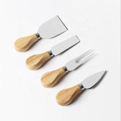 China Viable Novelty Gifts 4 Pieces 420 Mini Cutting Tool Set Handle Butter Spatula Slicer Fork Cheese Stainless Steel Rubber Knives for sale