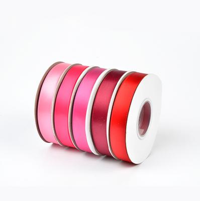 China Double Face Manufacture Wholesale Price 100% Polyester Double Face Solid Color Satin Ribbon For Packing for sale