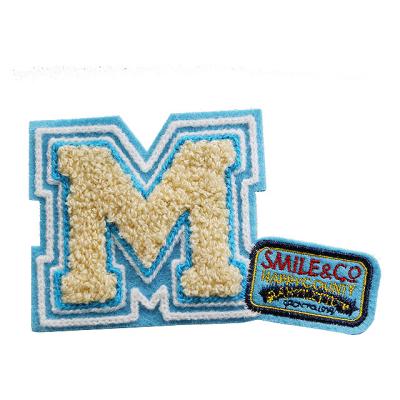 China Washable Latest and Most Popular Wholesale Custom Apparel Embroidery Patches for sale