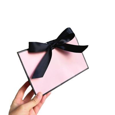 China Recyclable Customized Logo Gift Bag Any Size Paper Bag With Pink Black Edge Apparel Gift Bag for sale