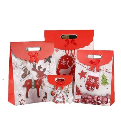 China New Style Recycled Materials Christmas Party Materials Custom Santa Claus Snowflake Gift Red Gift Wrapping Bag for sale