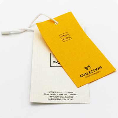 China New Fashion Sustainable Design, Factory Made Eco-friendly Embossed Paper Hang Tag With Own Logo And Rope Twine for sale