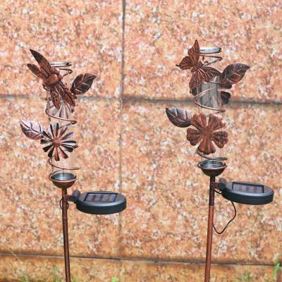 China Vintage Liffy Garden Stake LED Yard Patio Decor Metal Butterfly Dragonfly Solar Powered Rain Gauge for sale