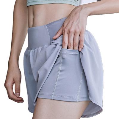 China Breathable Women 2 in 1 Running Tight Elastic Waist Pocket Yoga Shorts Woman Sports Short Sets For Woman for sale