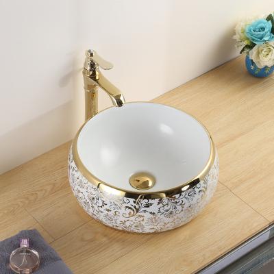 China Easy Clean Luxury Ceramic Vessel Sink Above Basin Gold Ceramic Bathroom Sink Hand Counter Wash Basin Sink for sale