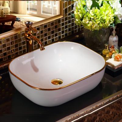 China Easy Clean Luxury Rich Gold Ceramic Vessel Sink Hotel Bathroom Sink Gold Plated Wash Basin for sale