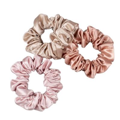 China Beautiful 100% Gerine Hair Rope Tie Hair Band Event Gift 100% Silk Skinny Scrunchies Custom Colored Silk Hair Band for sale