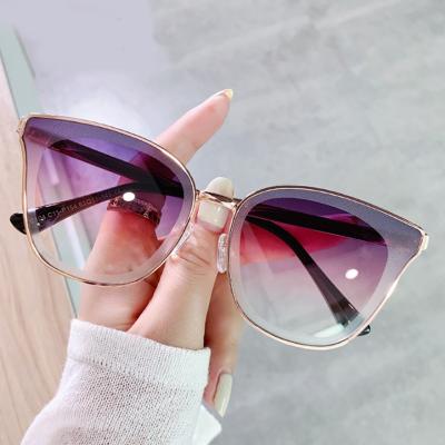 China Women 2022 New Arrival Metal Frame Fashion Sunglasses Women Cat Eye Sun Glasses Custom Logo Sunglasses for sale