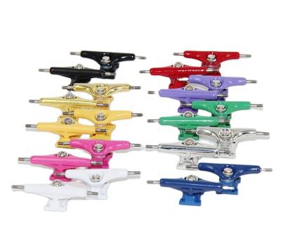 China New 2022 Zinc Alloy Solid Fingerboard Trucks Single Axle 32mm and 34mm Finger Skateboard Trucks 10 Colors with Lock Nuts for sale