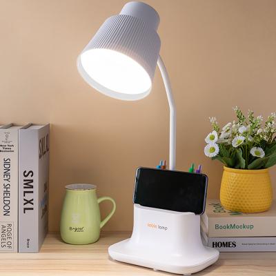 China DESIGN AND FUNCTION Yinke LED Desk Lamp With USB Charging Eye Protection Led Reading Lamp With Phone Holder Pen Hole for sale