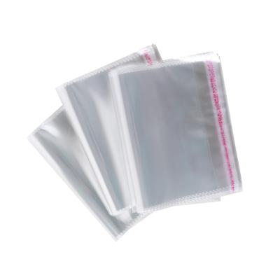 China Custom Logo Resealable Transparent Self Adhesive Clothing T-shirt Plastic Security Bag for sale