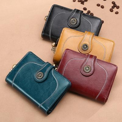 China Hot Selling Genuine Leather Vintage Purse Women Scare Vintage Leather Cow Leather Bags Clutch Wallet for sale