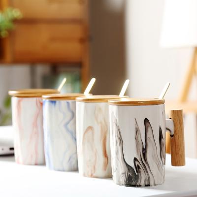 China OEM Factory Wideal Ceramic Mug Travel Disposable Porcelain Coffee Marble Ceramic Milk Cup With Wood Handle for sale