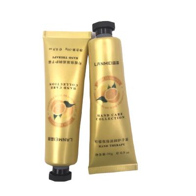 China Packaging Container Empty Cosmetic Tubes Hand Cream Laminated Soft Tube With Octagon Screw Cap for sale