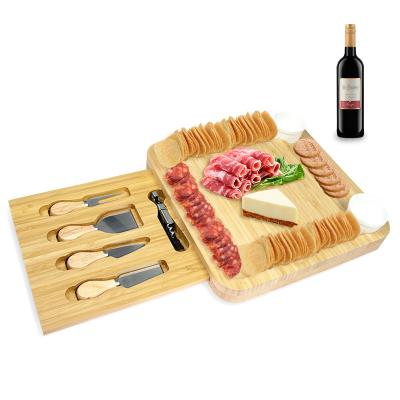 China Ceramic Cheese Board 2 Bowls 2 Serving Plates 4 Magnetic Drawers Bamboo Charcuterie Cutlery Knife Set for sale