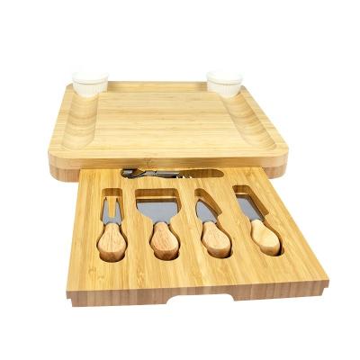 China Sustainable Premium Bamboo Cheese Board Charcuterie Serving Board Tray And Knife Set With Slide-Out Drawer for sale