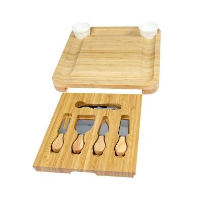 China Sustainable Cheese Board and Knife Set Bamboo Charcuterie Board with Magnetic SlideOut Drawer and 2 Ceramic Bowls for sale