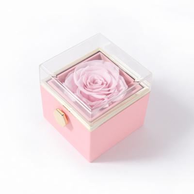 China Wholesale Modern New Arrival Customized Exquisite Revolving Surprise Preserved Roses Jewelry Box Ring Pendant Jewelry Display Storage Case for sale