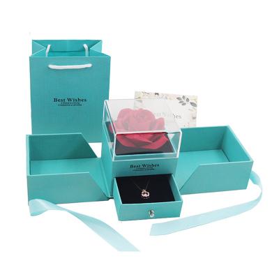 China Handmade Wholesale Blue Valentines Day Gifts Jewelry Display With Preserved/Soap Mounted Ring Earrings Necklace Jewelry Storage Case for sale