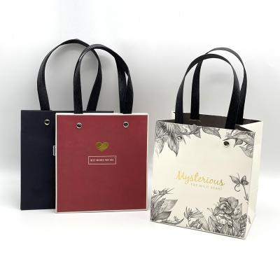 China Recycled Materials Wholesale Shopping Luxury Modern Custom Printed Paper Bag Special Design With Handle Kraft Bags Grocery Packaging Gift Bags for sale